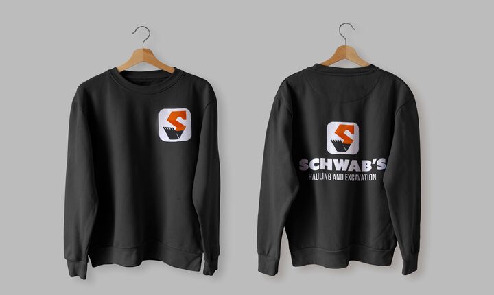 Sweatshirt design for Schwab’s Hauling and Excavation, a Tech Handoff client, front and back.